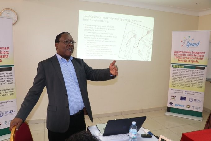 Prof. Freddie Ssengooba, from Makerere University School of Public Health, Director SPEED project making a presentation on Community Health Systems.