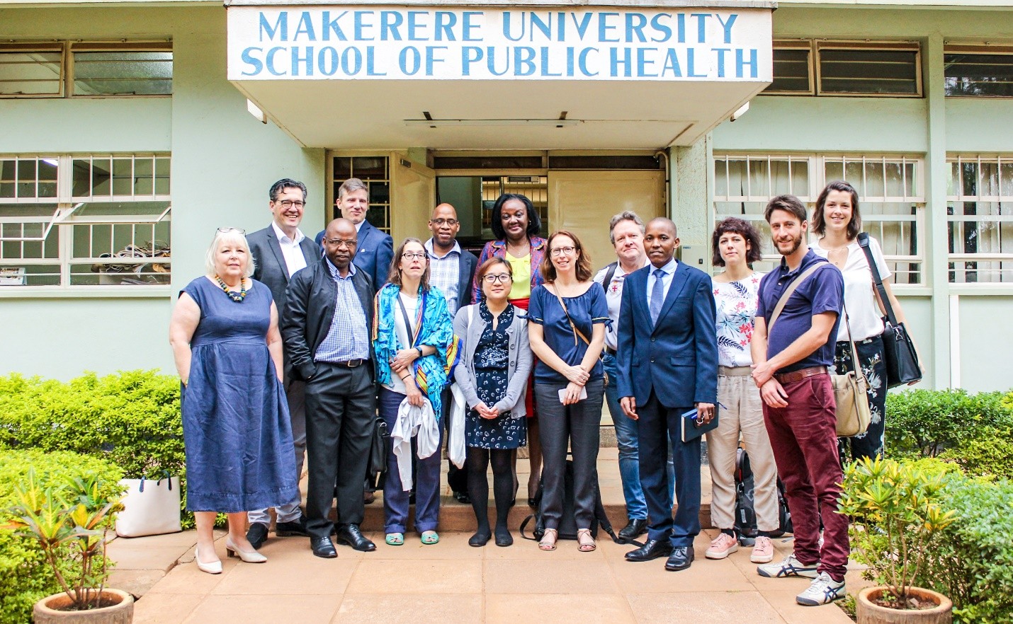 Center Back, Prof Rhoda Wanyenze, Dean, Makerere University School of Public Health and Dr. Geofrey Musinguzi (PI) in tie pose for a group photo with the consortium members at MakSPH.