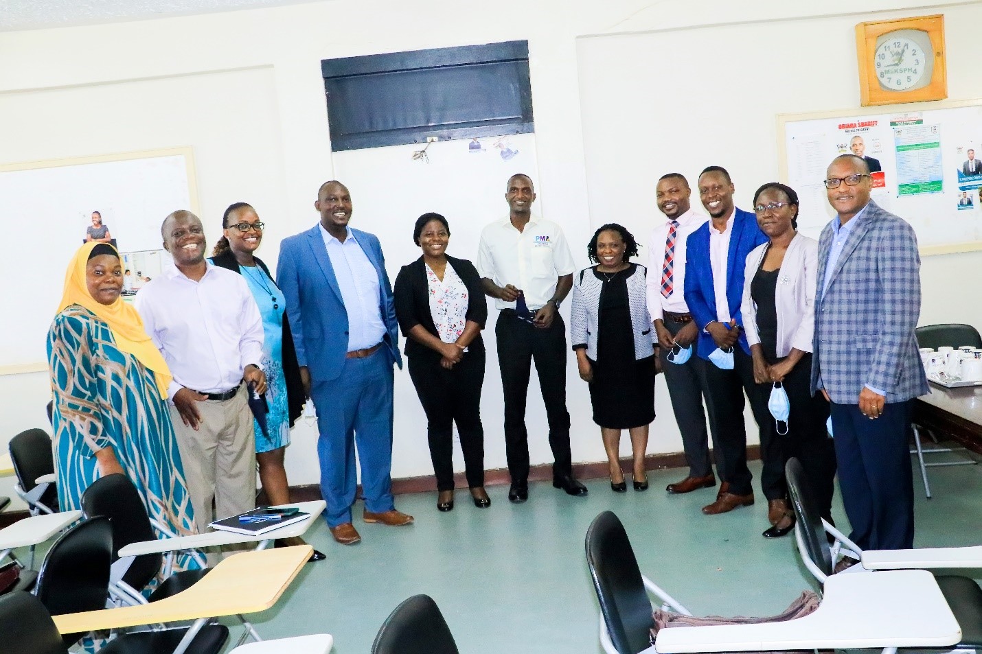 Members and Heads of Units at MakSPH in a group photo with a team from Jhpiego after sharing results of the 2nd OCA in February 2021. Photo by Davidson Ndyabahika