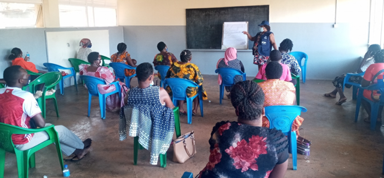 Ms. Grace Byarugaba, a Risk Communication Specialist from WHO Uganda training VHTs of Division A, Entebbe Municipality on risk communication for COVID-19.