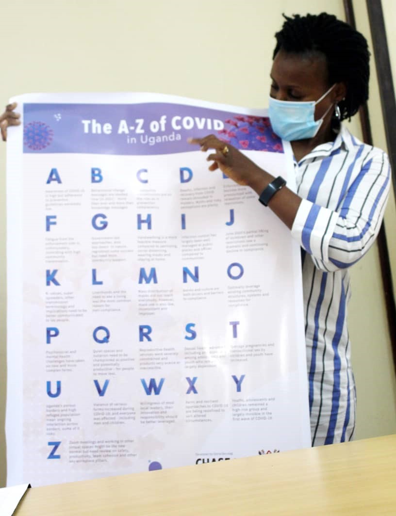 Dr Seruwagi unveiling the COVID Alphabet