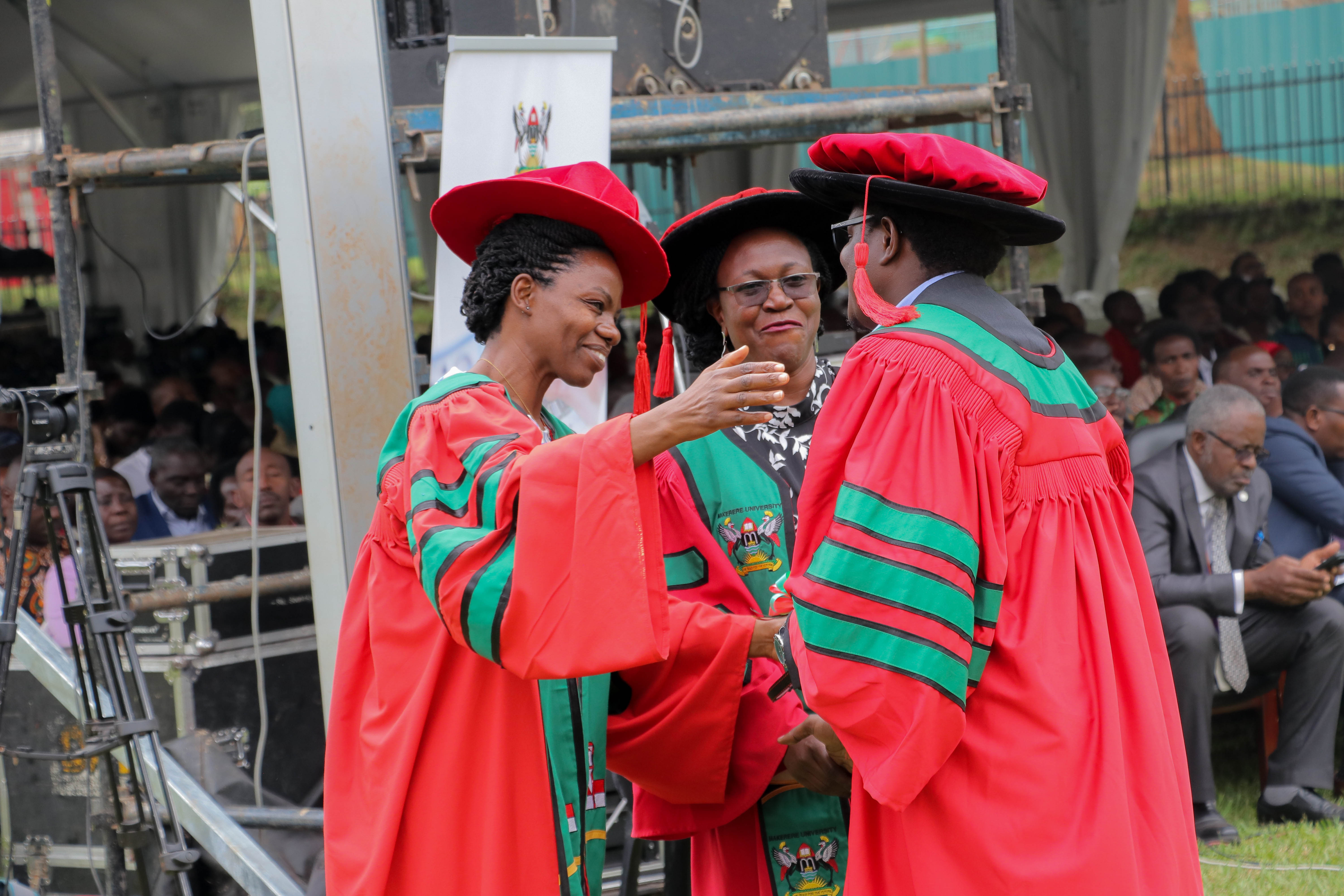 Dr. Esther Buregyeya. an Associate Professor and Chair of the Department of Disease Control and Environmental Health and Dr. Christine K. Nalwadda, Senior Lecturer and Head, Department of Community Health and Behavioral Sciences congratulate Muleme on his PhD