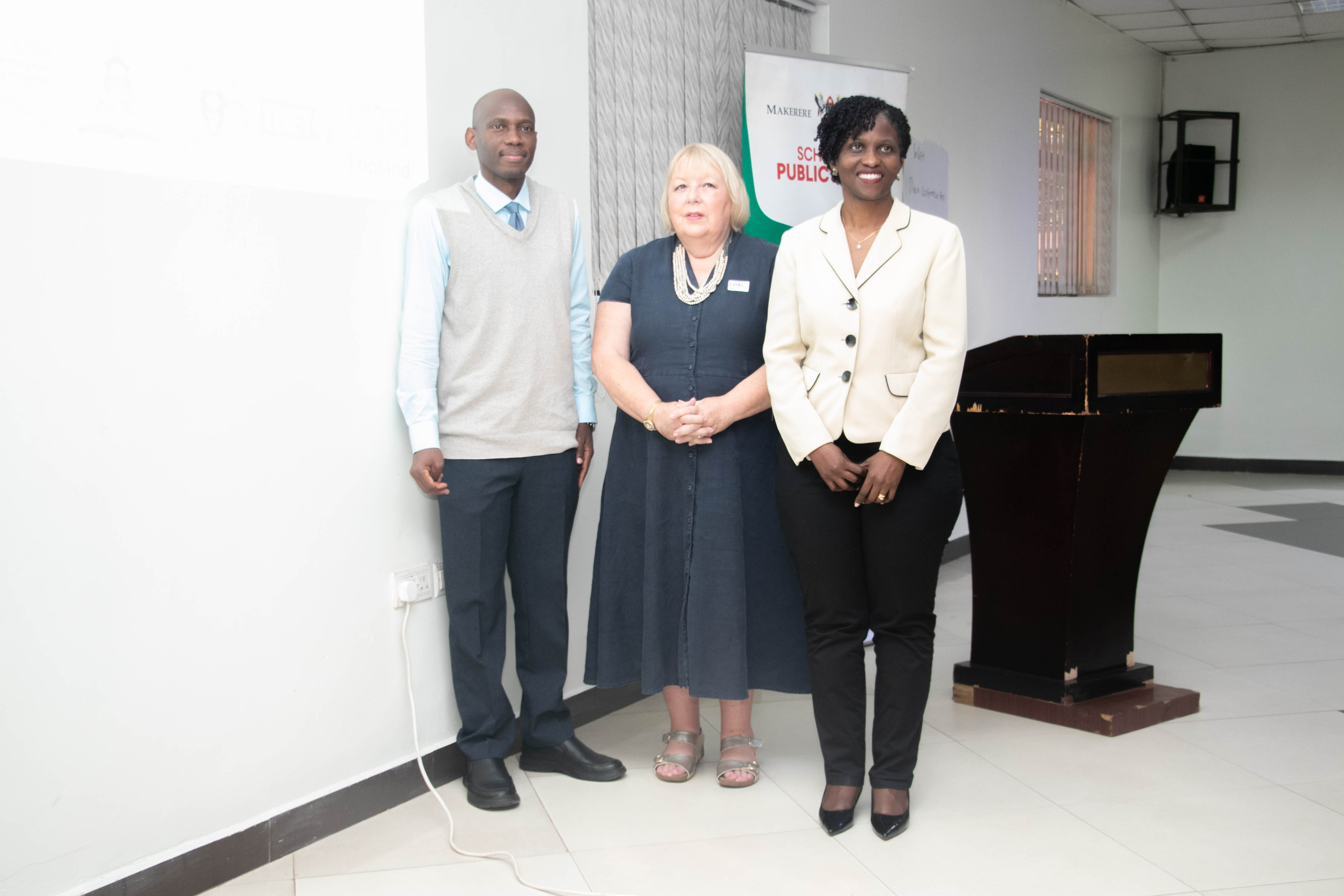 Dr. David Musoke and Prof. Linda Gibson, co-coordinators of the NTU-Mak partnership, and Dr. Sheba Gitta, Country Director for THET Uganda, pose for a photo during a break.