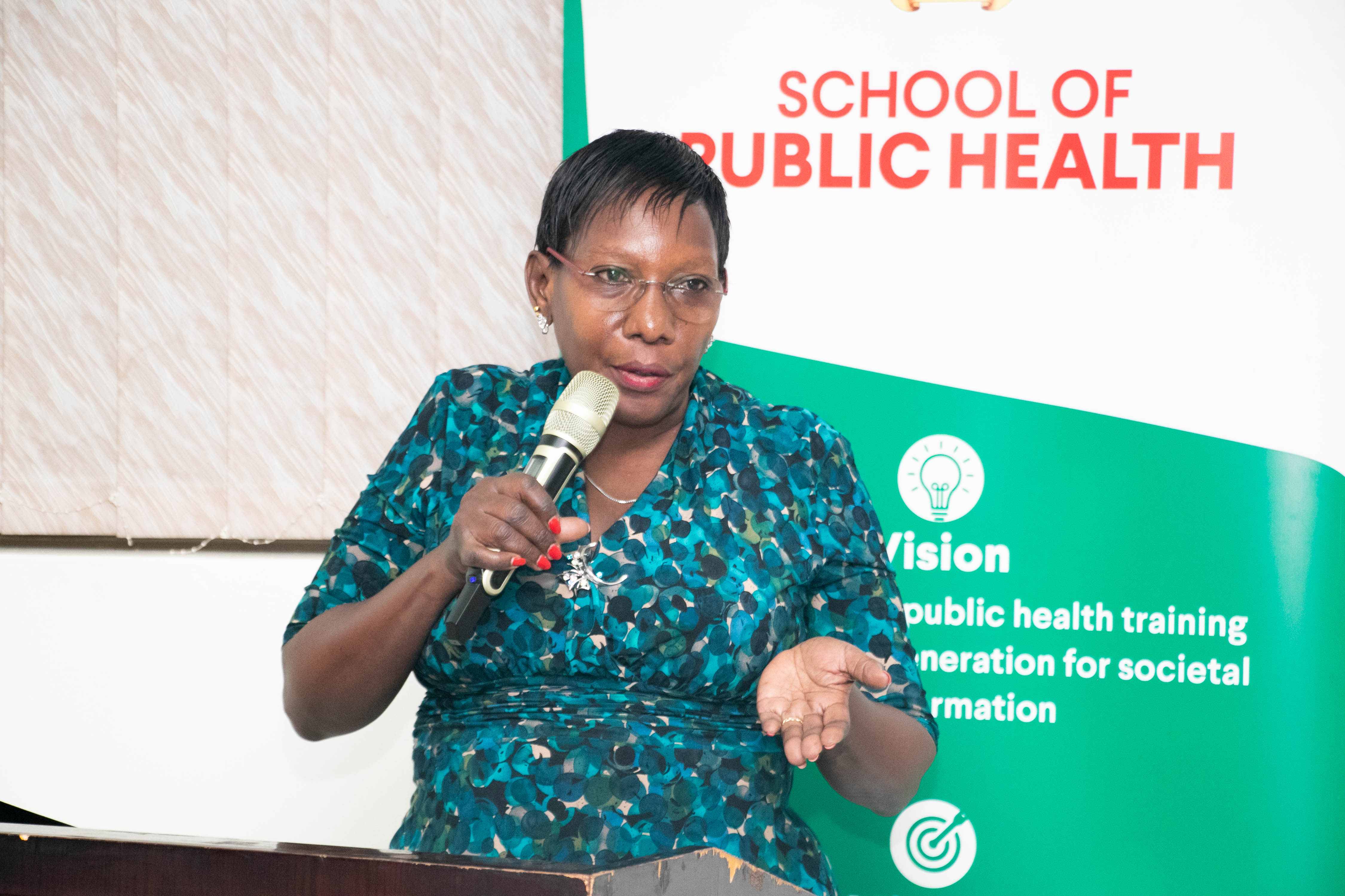 Dr. Sarah Byakika, the Ministry of Health Commissioner for Planning, Financing and Policy addressing the workshop participants.