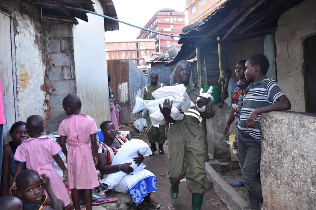LDU personnel distributing food relief during the COVID-19 pandemic