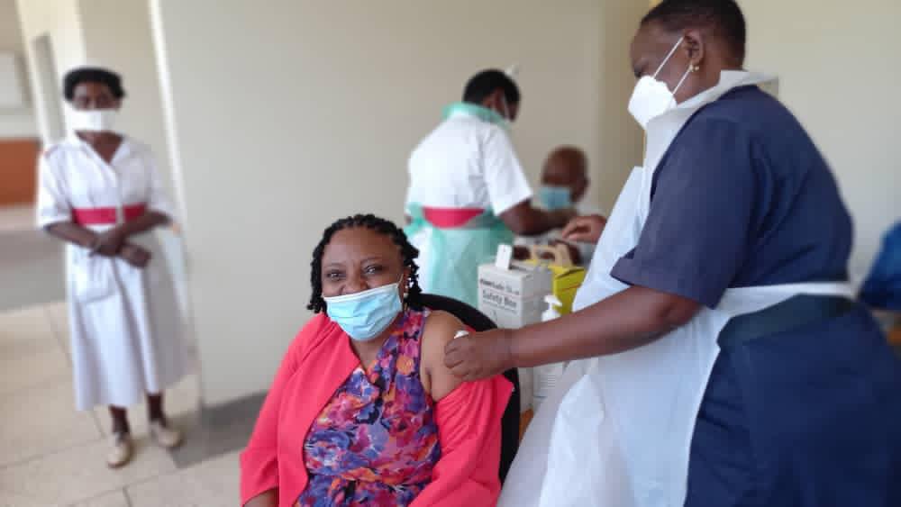 Prof. Damalie Nakanjako, Principal, Makerere University College of Health Sciences receive Vaccination against COVID-19 on March 20, 2021. MOH Photo.jpg
