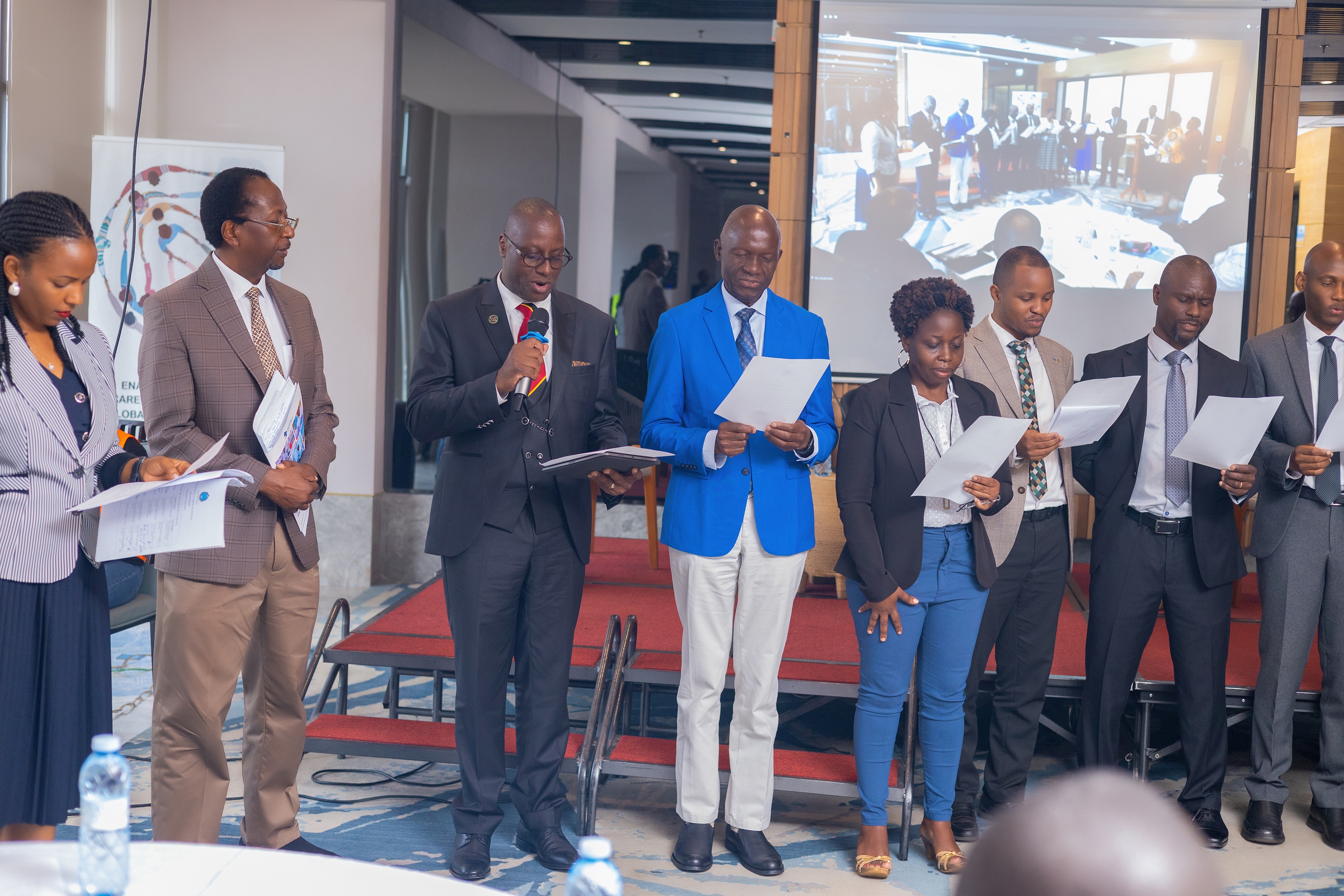 FUNAS fellows take their oaths during the induction ceremony at Four Points by Sheraton Hotel, Kampala