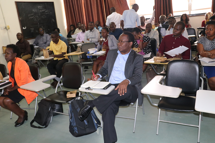 Dr. Freddie Sengooba (first row, right) chaired a session where the community at Makerere University School of Public Health shared ideas on how the NHIS bill can be structured to cater to the needs of all Ugandans.