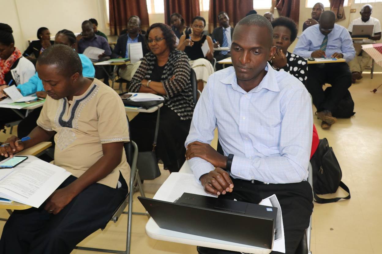 Participants at the MDM Curriculum Review Stakeholders’ Meeting. Front right is Dr. Simon Peter Kibira, a lecturer at MakSPH.