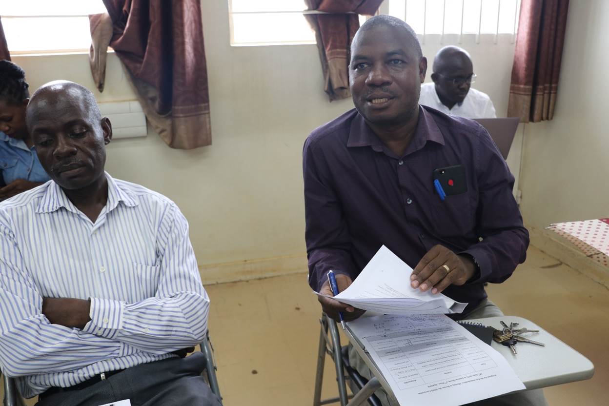 Dr. Simon Kasasa (right), a lecturer at MakSPH making a contribution during the stakeholders’ meeting. Left is Dr. John Bosco Ddamulira, also a lecturer at the School.