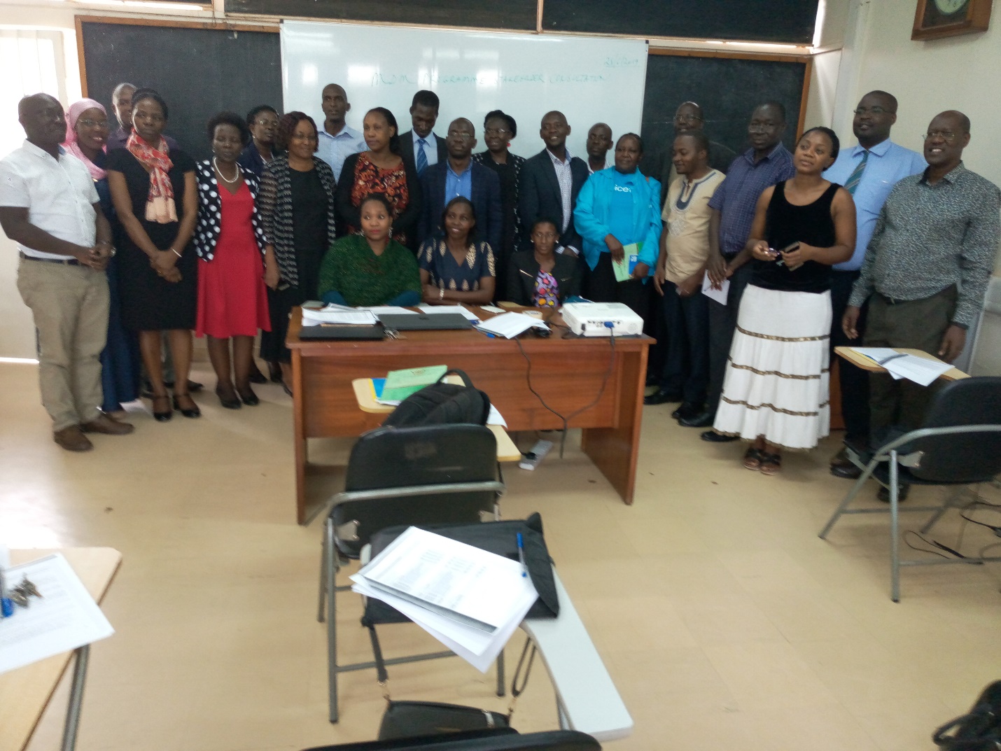 Stakeholders who attended the MDM Curriculum Review Workshop pose for a group picture. The alumni (sitting) at the front. Extreme right is Prof. Lynn Atuyambe who chaired the workshop.   